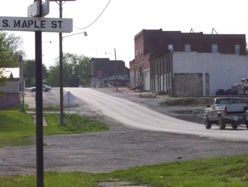 Main street Skidmore, Missouri where the shooting took place on July 10, 1981. Where the white car is parked is roughly where Ken McElroy's pickup was when he was shot. Photo taken by me in 2007.